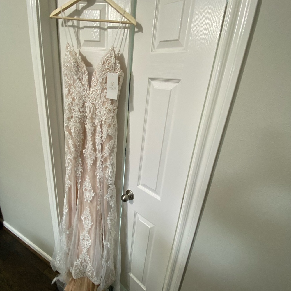 Brand new wedding dress. Last several pictures are from the Nox Anabel web site